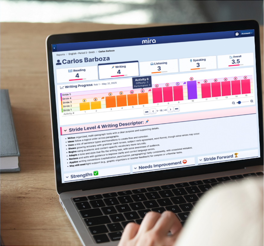 2025-07 Mira Stride Educator Dashboard with hand on computer 2025-07 Mira Stride Educator Dashboard with hand on computer