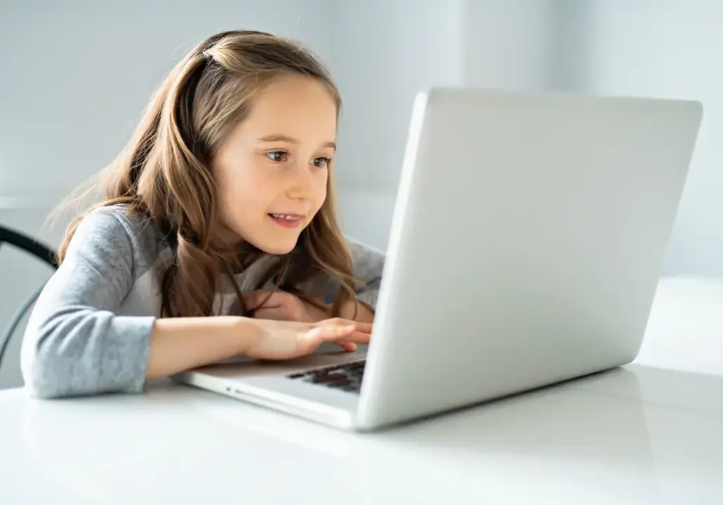 little girl on laptop